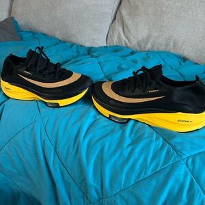 Zoom Men's Running Shoes in Black and Yellow with Tan Accent size 12